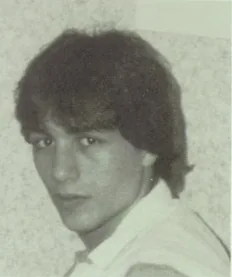 Joe Rogan in his 1985 high school yearbook photo with full dark hair