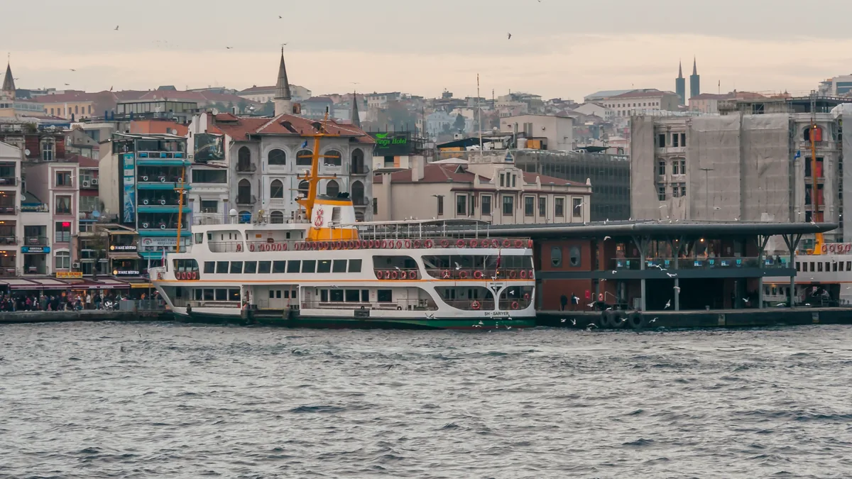 Commuter ferries moored at the Karaköy pier on the Istanbul waterfront